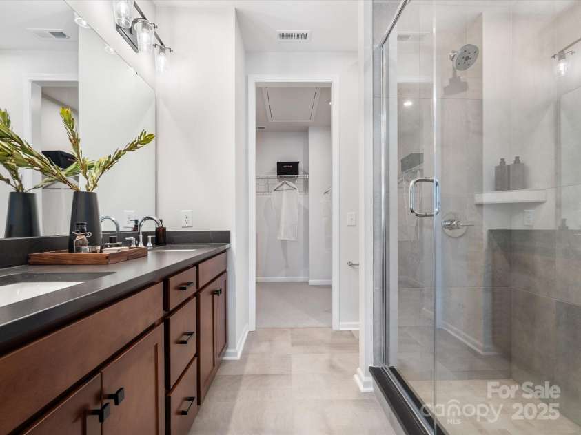 5628 Kingspan Drive, Charlotte, NC 28217.  MLS# CAR4211467, YatesRealty ID 6819. Collins Model Primary Bath | Southmont *actual finishes, color scheme, orientation vary on this home. Furniture not included