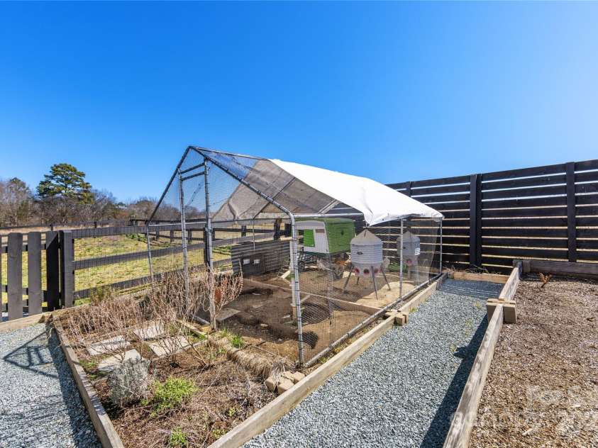 1323 Stack Road, Monroe, NC 28112.  MLS# CAR4232162, YatesRealty ID 6823. Side Yard