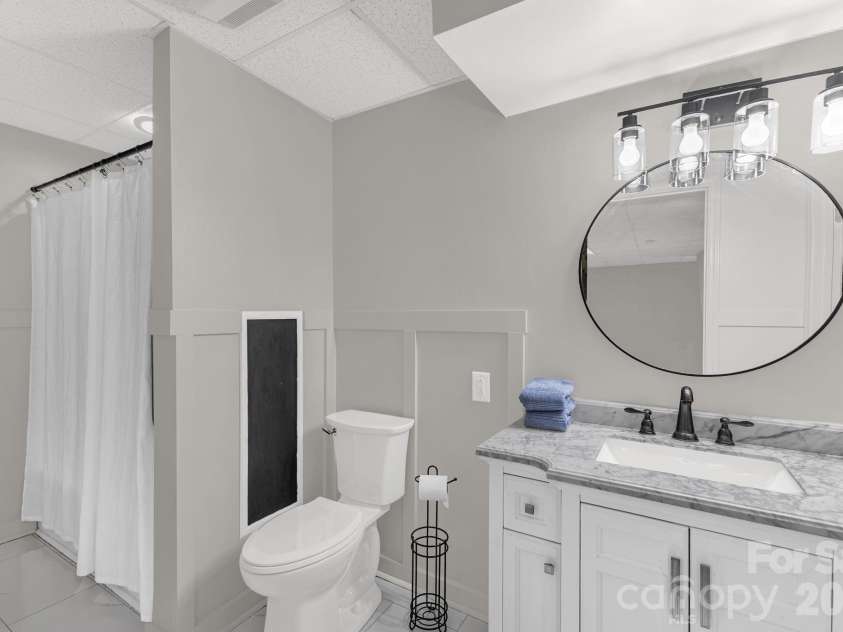 3921 Peach Street, Newton, NC 28658.  MLS# CAR4357267, YatesRealty ID 6838. Basement bathroom
