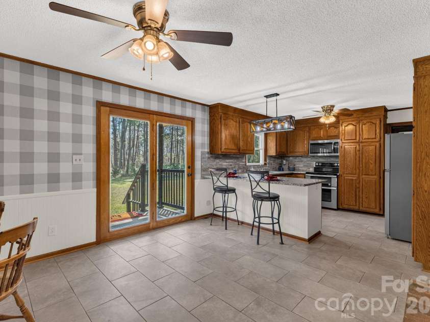 3921 Peach Street, Newton, NC 28658.  MLS# CAR4357267, YatesRealty ID 6838. Kitchen on main level