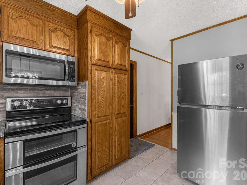 3921 Peach Street, Newton, NC 28658.  MLS# CAR4357267, YatesRealty ID 6838. Kitchen on main level