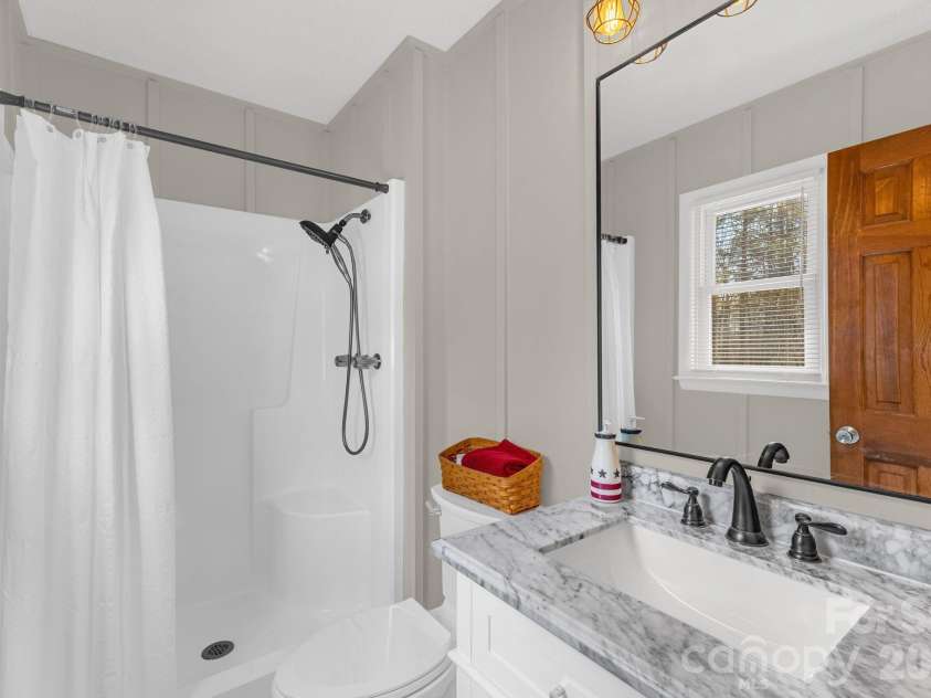 3921 Peach Street, Newton, NC 28658.  MLS# CAR4357267, YatesRealty ID 6838. Primary bathroom