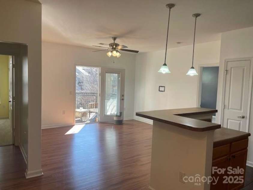 202 Brickton Village Circle, Fletcher, NC 28732.  MLS# CAR4137403, YatesRealty ID 6840. Kitchen/ living room