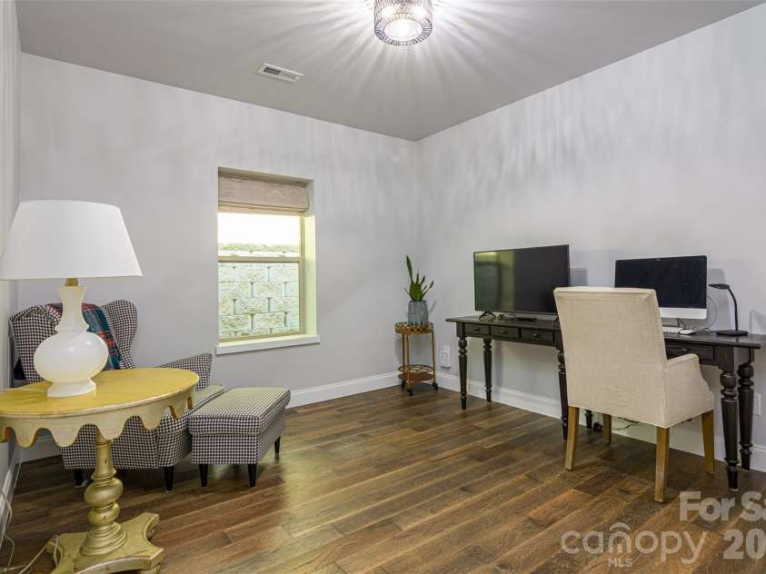 151 Unoga Court, Brevard, NC 28712.  MLS# CAR4279300, YatesRealty ID 6841. 3rd Bedroom. Shown as an office.