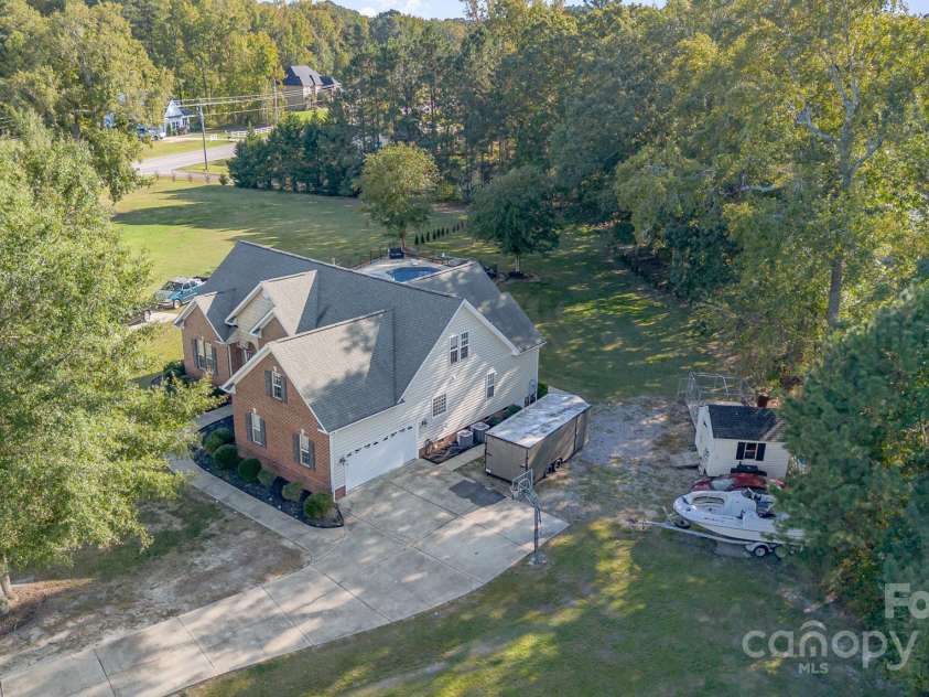 9404 Perimeter Court, Zebulon, NC 27597.  MLS# CAR4191333, YatesRealty ID 6842. Take in a bird's-eye view, showcasing its architectural charm, perfect for appreciating the full layout of your dream home!