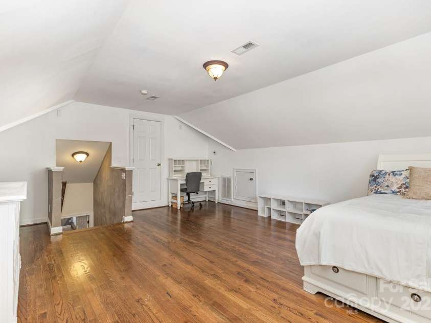 9404 Perimeter Court, Zebulon, NC 27597.  MLS# CAR4191333, YatesRealty ID 6842. The expansive bonus room upstairs is a versatile space perfect for an office, den, craft room, or play area. Let your imagination run wild and design a space that truly enhances your lifestyle!