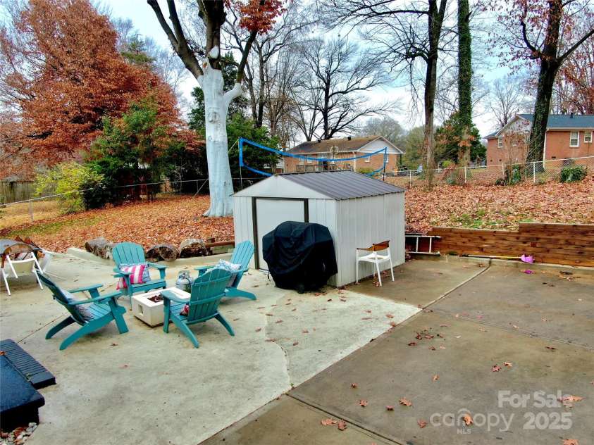 1521 Lanewood Place, Charlotte, NC 28208.  MLS# CAR4326904, YatesRealty ID 6843. Backyard from right side driveway