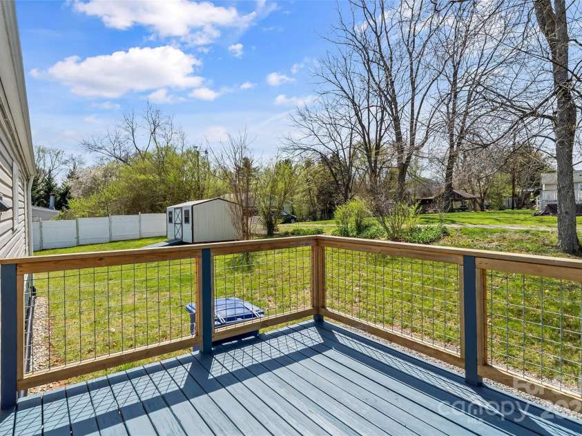 4 Saint Matthews Drive, Candler, NC 28715.  MLS# CAR4241573, YatesRealty ID 6844. Back deck