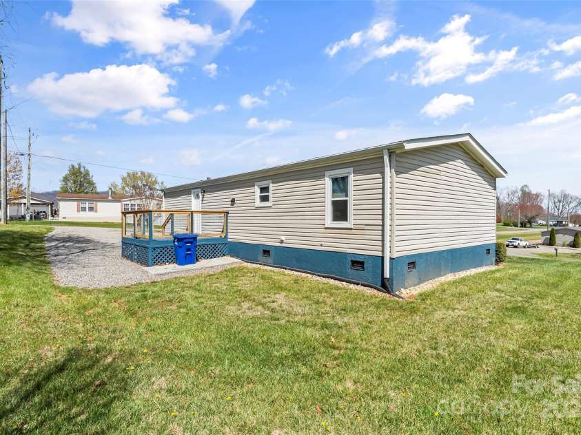 4 Saint Matthews Drive, Candler, NC 28715.  MLS# CAR4241573, YatesRealty ID 6844. Back of home