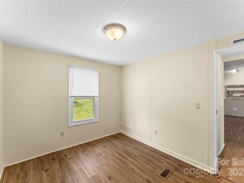 4 Saint Matthews Drive, Candler, NC 28715.  MLS# CAR4241573, YatesRealty ID 6844. Bedroom 2