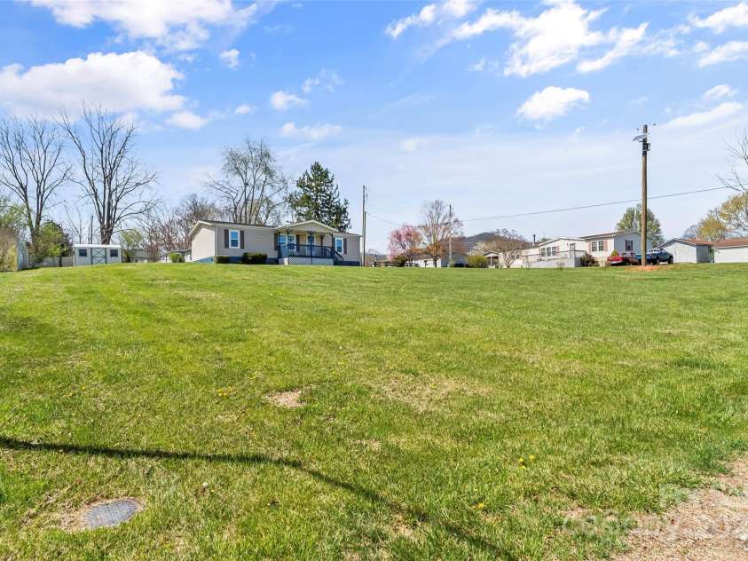 4 Saint Matthews Drive, Candler, NC 28715.  MLS# CAR4241573, YatesRealty ID 6844. Corner lot