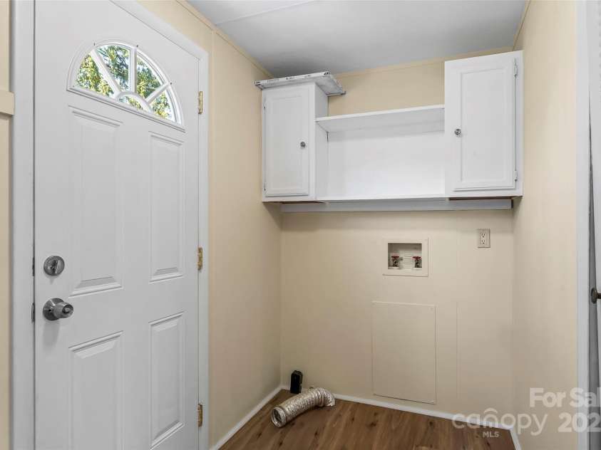 4 Saint Matthews Drive, Candler, NC 28715.  MLS# CAR4241573, YatesRealty ID 6844. Laundry Room