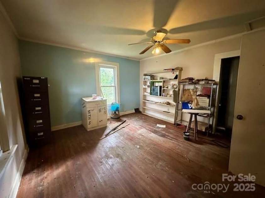 6000 Main Street, Salisbury, NC 28147.  MLS# CAR4248591, YatesRealty ID 6845. ACTUAL - FONT BEDROOM WITH THE ORIGINAL HARDWOOD FLOORS. THIS WOULD BE CONSIDERED THE PRIMARY