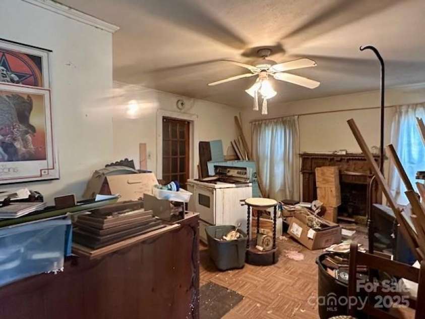 6000 Main Street, Salisbury, NC 28147.  MLS# CAR4248591, YatesRealty ID 6845. ACTUAL - LIVING ROOM -LOOK PAST THE PERSONAL ITEMS AND USE YOUR VISION. THE WOOD DOOR LEADS TO THE DINING ROOM