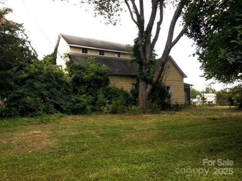 6000 Main Street, Salisbury, NC 28147.  MLS# CAR4248591, YatesRealty ID 6845. ACTUAL - SIDE OF THIE HOUSE FROM SPACIOUS YARD.