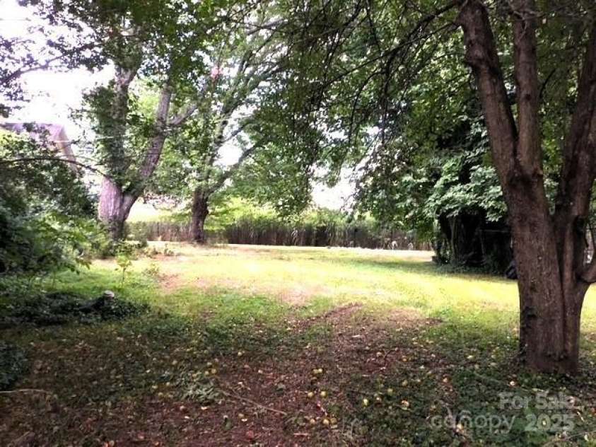 6000 Main Street, Salisbury, NC 28147.  MLS# CAR4248591, YatesRealty ID 6845. ANOTHER VIEW OF THE SPACIOUS SIDE YARD
