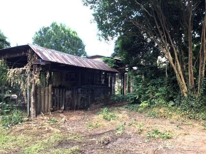 6000 Main Street, Salisbury, NC 28147.  MLS# CAR4248591, YatesRealty ID 6845. BACK SIDE OF THE PARKING SHELTER AND HOUSE