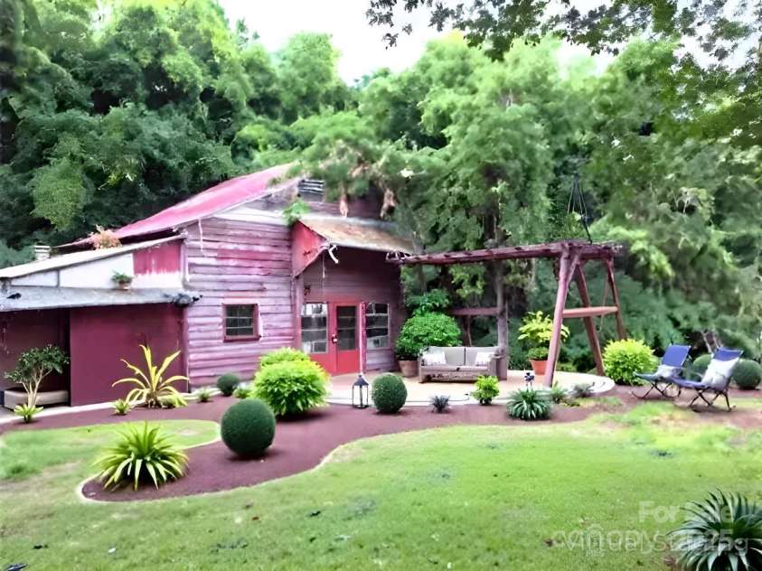 6000 Main Street, Salisbury, NC 28147.  MLS# CAR4248591, YatesRealty ID 6845. *VIRTUAL IMAGE* OF THE BARN SHOWING IT WITH AN OUTSIDE SITTING AREA
