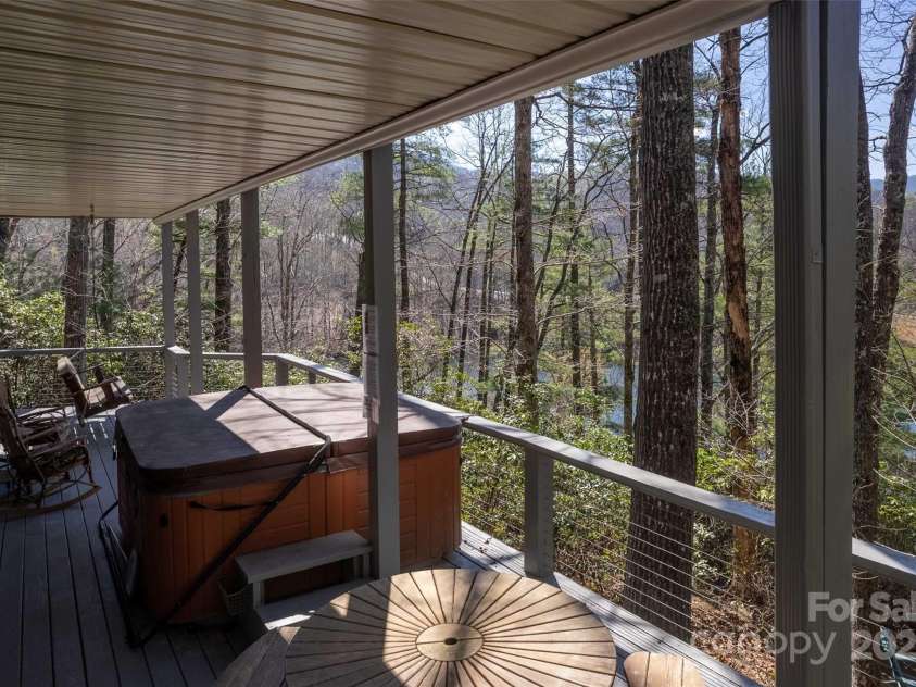 136 Dars Lane, Tuckasegee, NC 28783.  MLS# CAR4248083, YatesRealty ID 6851. Basement Deck with views