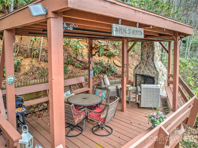 243 Old Still Road, Maggie Valley, NC 28751.  MLS# CAR4237252, YatesRealty ID 6857. Covered deck