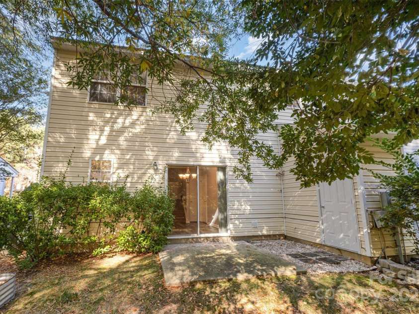 8230 Rudolph Road, Charlotte, NC 28216.  MLS# CAR4319455, YatesRealty ID 6859. Back Exterior