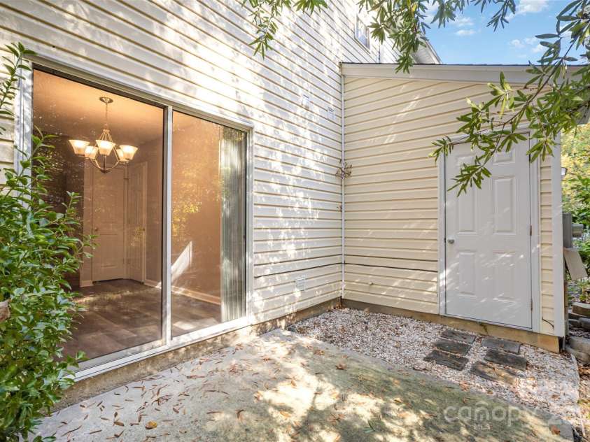 8230 Rudolph Road, Charlotte, NC 28216.  MLS# CAR4319455, YatesRealty ID 6859. Back Patio