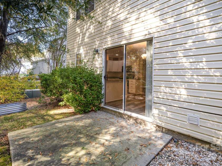 8230 Rudolph Road, Charlotte, NC 28216.  MLS# CAR4319455, YatesRealty ID 6859. Back Patio