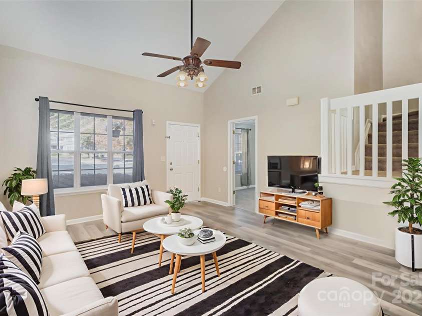 8230 Rudolph Road, Charlotte, NC 28216.  MLS# CAR4319455, YatesRealty ID 6859. Living Room *Virtually Staged*