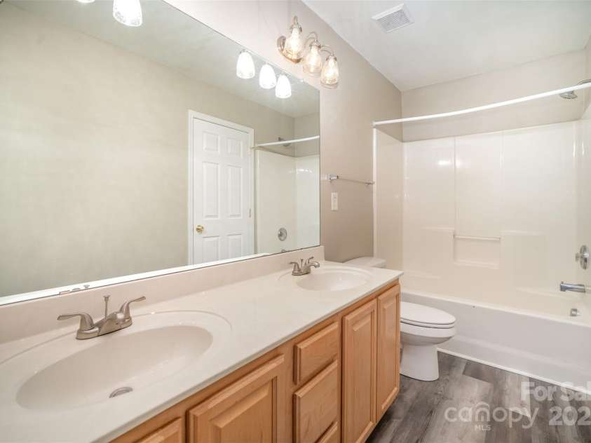 8230 Rudolph Road, Charlotte, NC 28216.  MLS# CAR4319455, YatesRealty ID 6859. Primary Bathroom