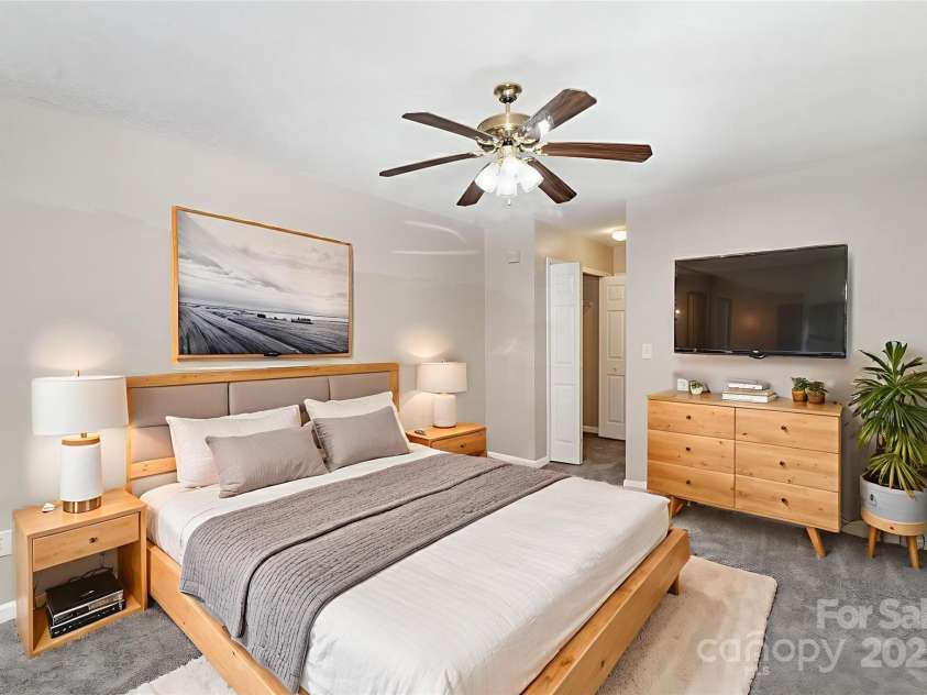 8230 Rudolph Road, Charlotte, NC 28216.  MLS# CAR4319455, YatesRealty ID 6859. Primary Bedroom on main level *Virtually Staged*