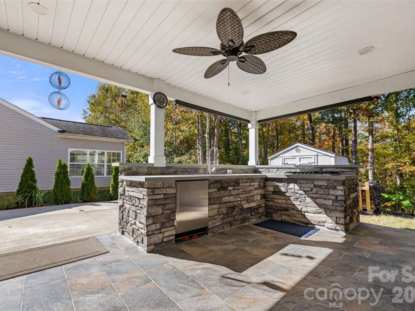 1828 Kilkenny Drive, Clover, SC 29710.  MLS# CAR4316666, YatesRealty ID 6860. Outdoor kitchen and covered porch