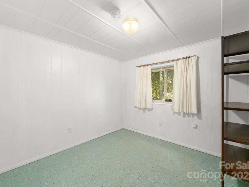 11 Hudson Lane, Fletcher, NC 28732.  MLS# CAR4241916, YatesRealty ID 6867. Extra room in the basement - with window and closet