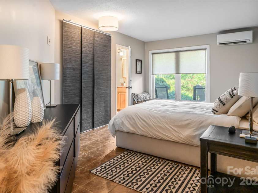 79 Horizon Hill Road, Asheville, NC 28804.  MLS# CAR4306563, YatesRealty ID 687. Lower Level Bedroom