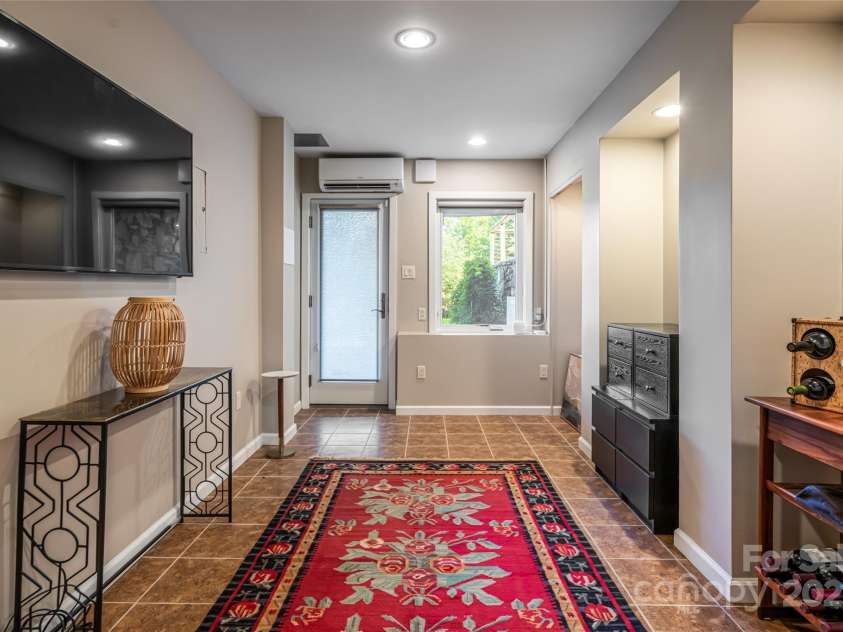 79 Horizon Hill Road, Asheville, NC 28804.  MLS# CAR4306563, YatesRealty ID 687. Wine Room, Workout Space or 4th Bdrm?