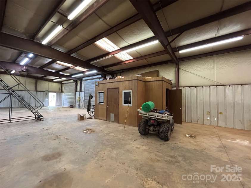 621 Pleasant Grove Road, Rutherfordton, NC 28139.  MLS# CAR4208576, YatesRealty ID 6871. Interior of the metal building