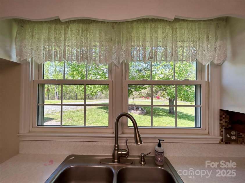 621 Pleasant Grove Road, Rutherfordton, NC 28139.  MLS# CAR4208576, YatesRealty ID 6871. Your view when washing dishes.