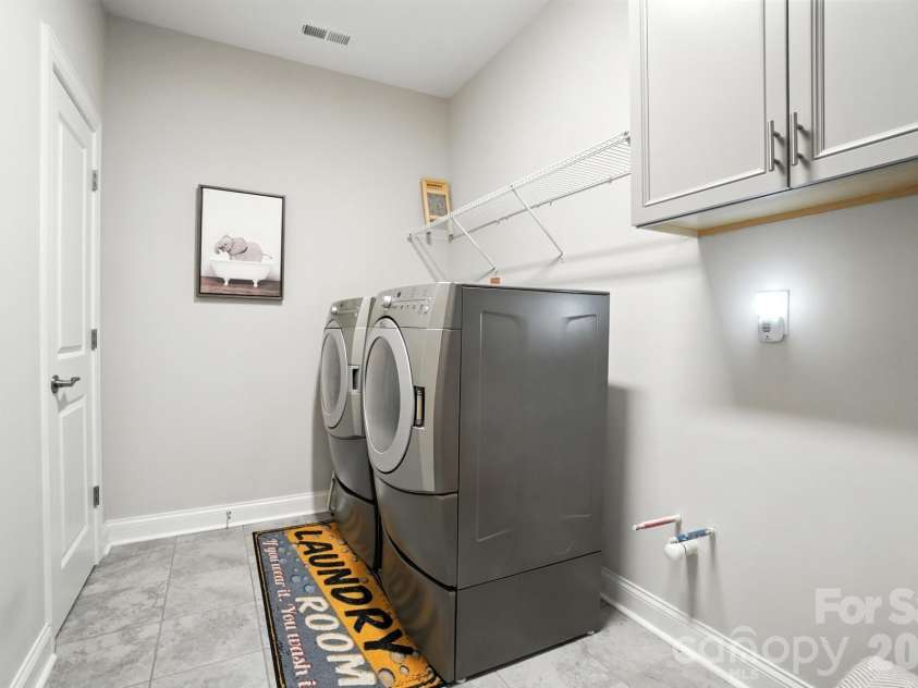 695 Poplar View Drive, Concord, NC 28027.  MLS# CAR4361870, YatesRealty ID 6872. Spacious Laundry Room