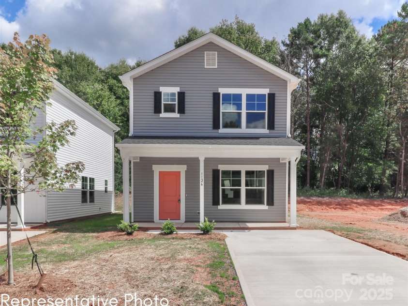 552 Ridge Avenue, Mooresville, NC 28115.  MLS# CAR4244895, YatesRealty ID 6876. Elevation A - dark gray vinyl exterior with black shutters.*This photo is a representation of what is being built.
