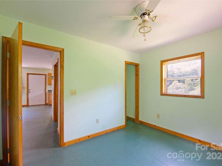 556 Blue Hill Road, Marshall, NC 28753.  MLS# CAR4154163, YatesRealty ID 6887. Bedroom in secondary building