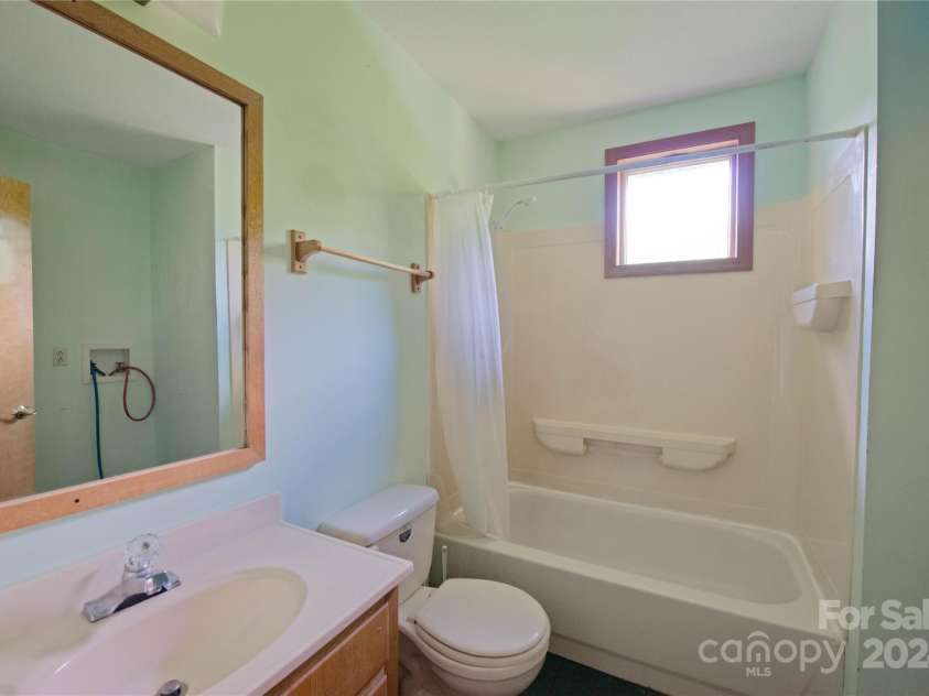 556 Blue Hill Road, Marshall, NC 28753.  MLS# CAR4154163, YatesRealty ID 6887. Full bath in secondary building