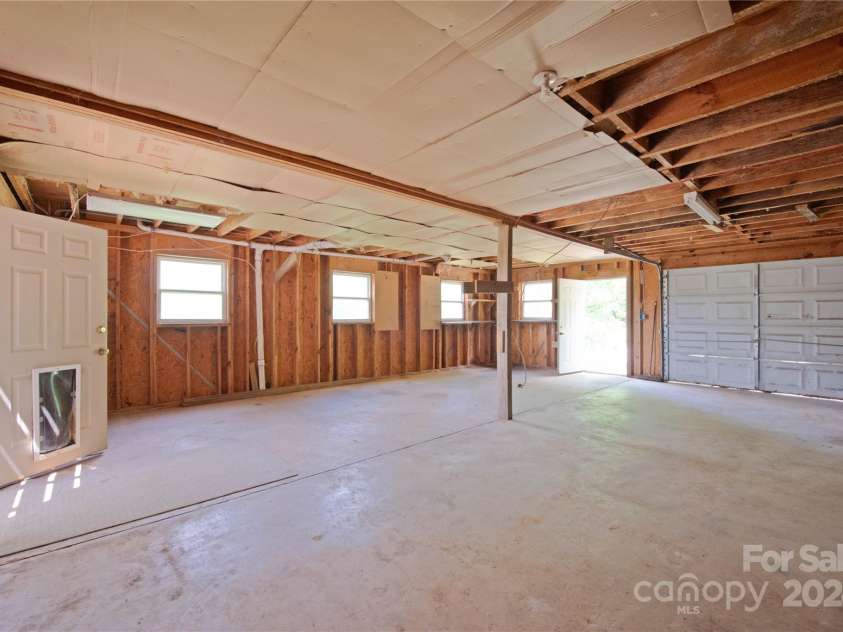 556 Blue Hill Road, Marshall, NC 28753.  MLS# CAR4154163, YatesRealty ID 6887. Large garage or workshop