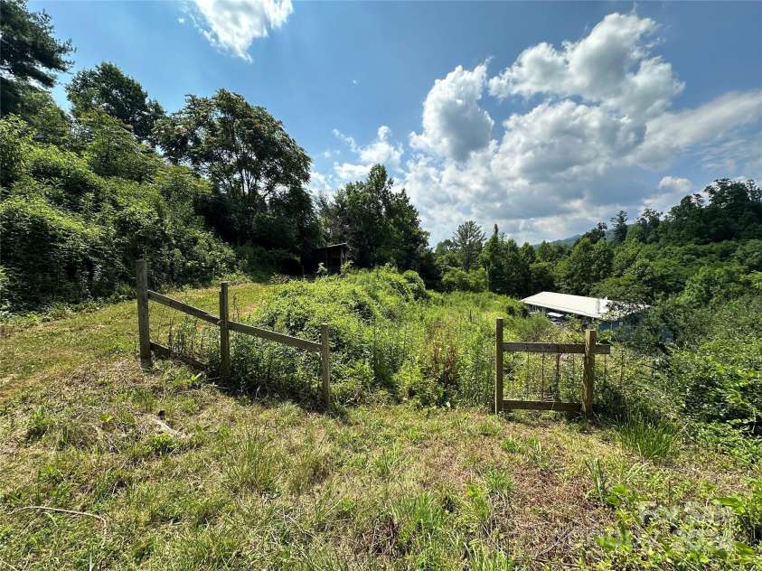 556 Blue Hill Road, Marshall, NC 28753.  MLS# CAR4154163, YatesRealty ID 6887. Old garden area