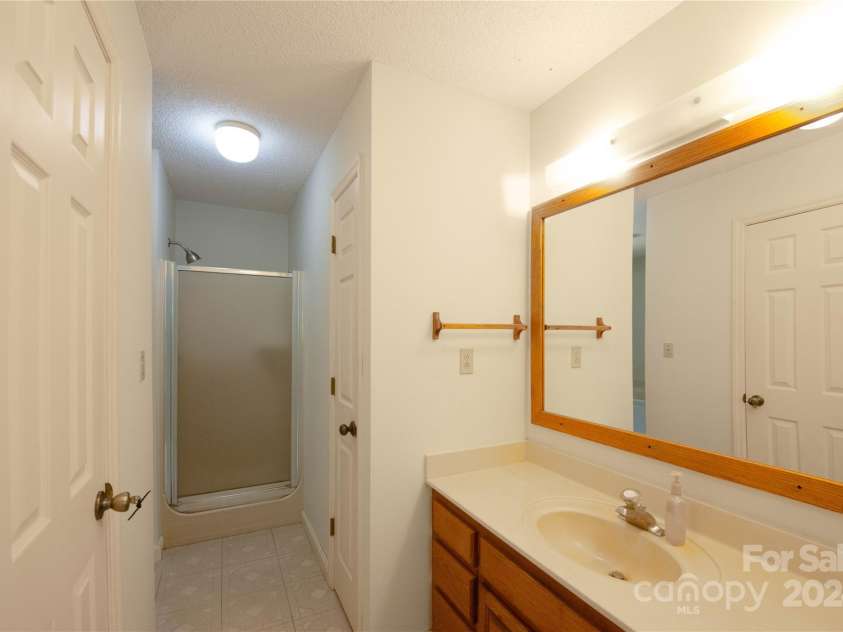 556 Blue Hill Road, Marshall, NC 28753.  MLS# CAR4154163, YatesRealty ID 6887. Primary bathroom