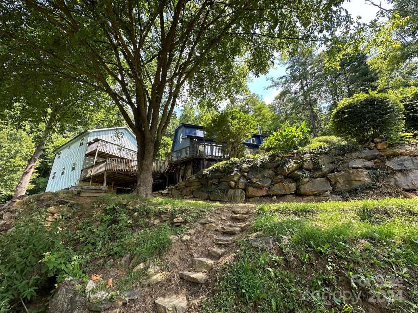 556 Blue Hill Road, Marshall, NC 28753.  MLS# CAR4154163, YatesRealty ID 6887. So much rock work!