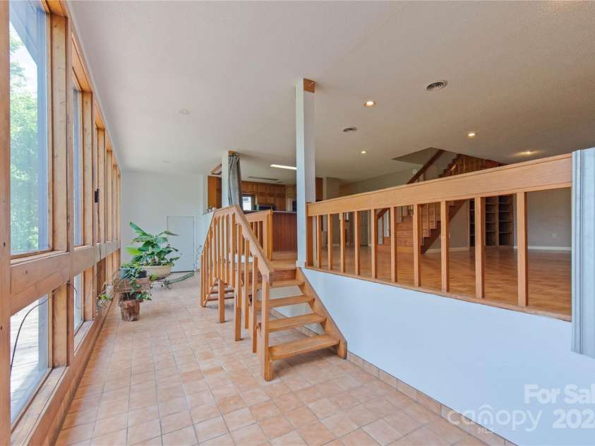 556 Blue Hill Road, Marshall, NC 28753.  MLS# CAR4154163, YatesRealty ID 6887. Turn this into a year round plant jungle!