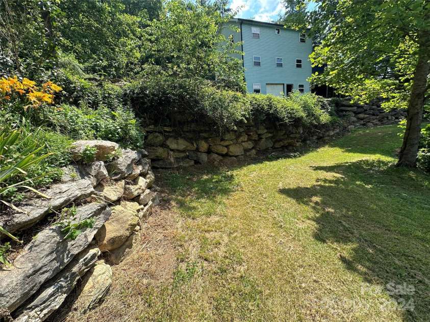 556 Blue Hill Road, Marshall, NC 28753.  MLS# CAR4154163, YatesRealty ID 6887. View of secondary building from driveway