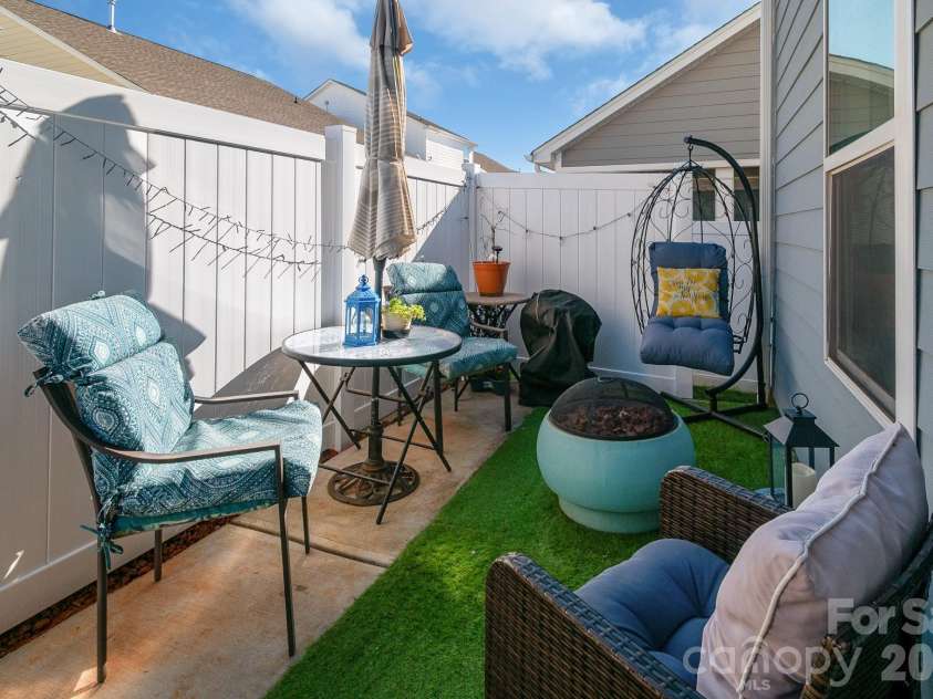 40154 Crooked Stick Drive, Lancaster, SC 29720.  MLS# CAR4335136, YatesRealty ID 6889. The back patio has a privacy panel enclosure.