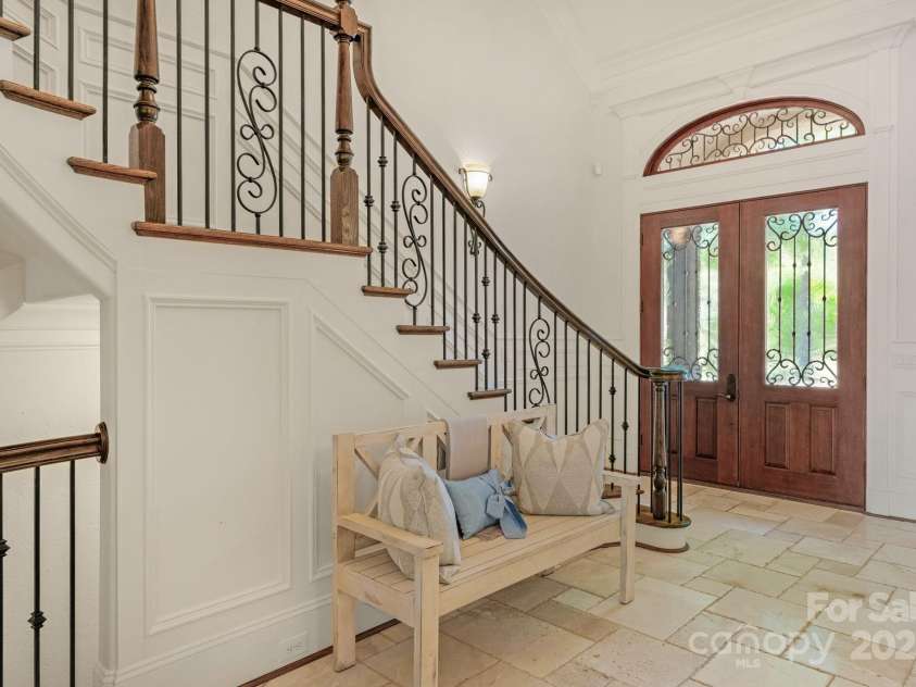 3255 Lake Pointe Drive, Belmont, NC 28012.  MLS# CAR4211520, YatesRealty ID 689. Custom staircase and Mahagony front door