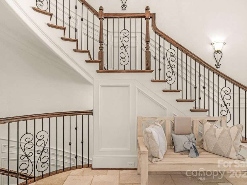 3255 Lake Pointe Drive, Belmont, NC 28012.  MLS# CAR4211520, YatesRealty ID 689. Follow beautiful staircase down to 2nd living quarters