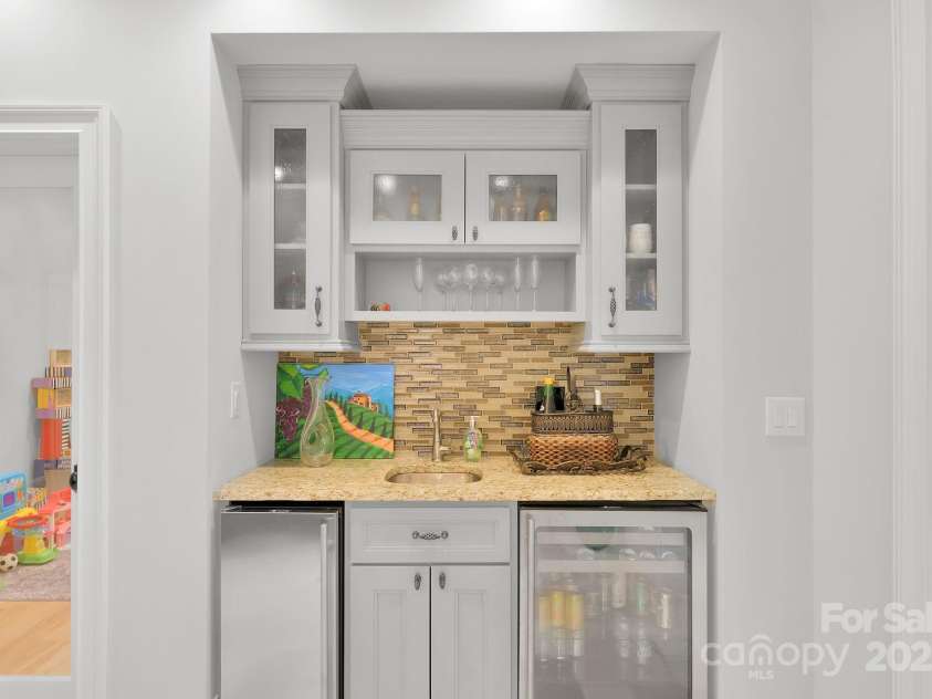 3255 Lake Pointe Drive, Belmont, NC 28012.  MLS# CAR4211520, YatesRealty ID 689. Mini bar and beverage frig in basement